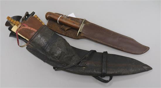 A Kukri with accessories to scabbard and a Burmese dagger